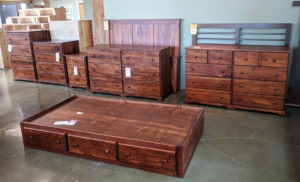 View of Fenton MacLaren store showing pine bedroom furniture with cherry color finish